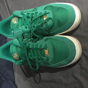 Nike Green Sneakers with Gold Details